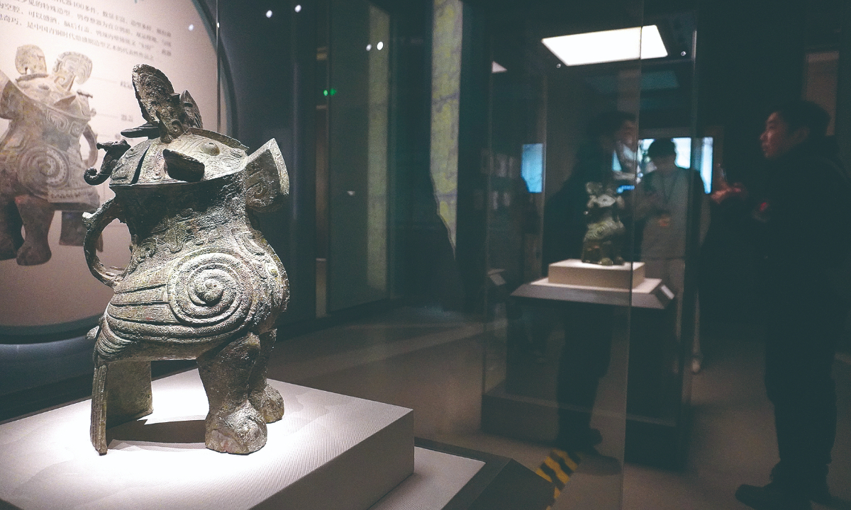 Visitors admire two Fu Hao owl-shaped vessels on April 2, 2026, in Zhengzhou, Central China’s Henan Province. A special exhibition opened at the Henan Museum, featuring two Shang Dynasty (c.1600BC-1046BC) bronze vessels – the Fu Hao owl-shaped vessel – from the National Museum of China and the Henan Museum. This marks the first time in 50 years since their excavation that the two vessels have been displayed together in their hometown of Henan. The vessels are currently the earliest bird-shaped bronze wine vessels discovered in China. Photo: VCG