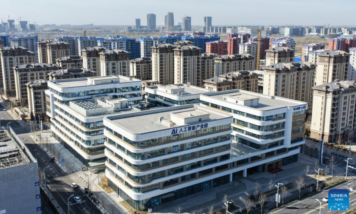 An aerial drone photo taken on March 18, 2026 shows an artificial intelligence industrial park in the Xiong'an New Area in north China's Hebei Province. Since China announced plans to establish the Xiong'an New Area in April 2017, the city has evolved from a blueprint into a vibrant city. This new area is designed to relieve functions that are non-essential to Beijing's role as the national capital and advance the coordinated development of the Beijing-Tianjin-Hebei region. In the nine years, Xiong'an has, from the very beginning, adhered to high standards of planning and design, adopting a 