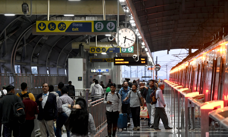 Passenger are seen at a train station in New Delhi, India, on February 22, 2026. Photo: VCG