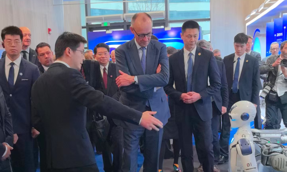 German Chancellor Friedrich Merz watches a robot, as he visited Unitree Robotics in Hangzhou, East China's Zhejiang Province, on February 26, 2026. Photo: Zhang Yiyi/GT