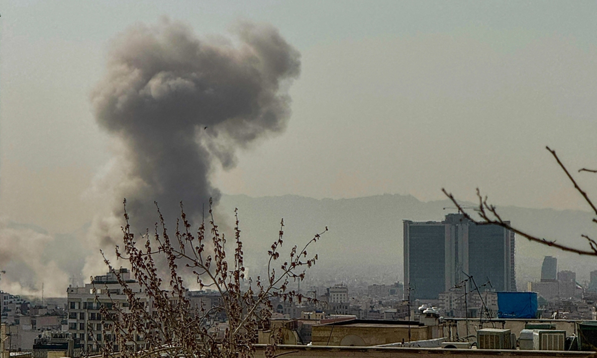 A plume of smoke rises over Tehran, Iran, after a reported explosion on February 28, 2026, after Israel said it carried out a preemptive strike on Iran. Photo: IC 