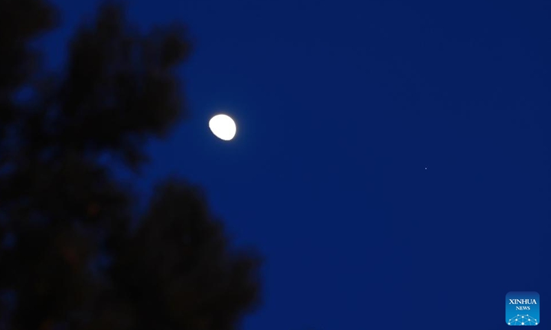 This photo taken on Feb. 27, 2026 shows the planet of Jupiter next to the moon in the sky over Jagdaqi, northeast China's Heilongjiang Province. (Photo by Zhuang Yu/Xinhua)

