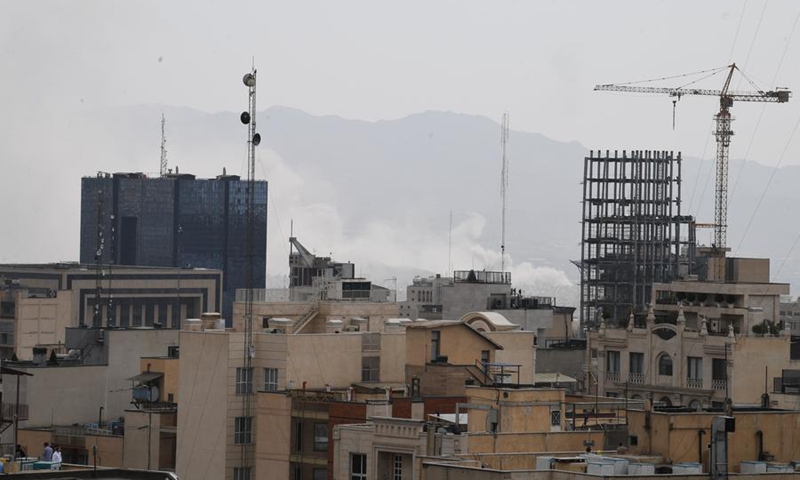 This photo taken on Feb. 28, 2026 shows thick smoke rising in downtown Tehran, Iran. (Xinhua/Shadati)