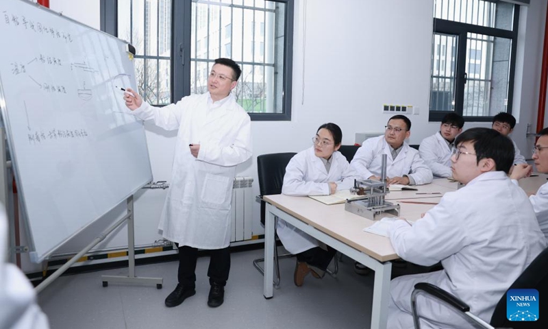 Zhang Fan presides over a discussion of an experimental plan at a laboratory of an electrical equipment company of China Electrical Equipment Group in Jinan, east China's Shandong Province, Feb. 13, 2026. Photo: Xinhua