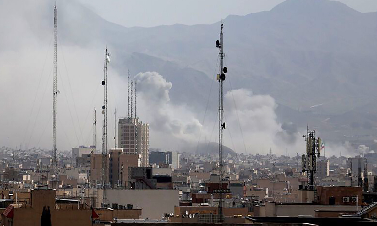 Smoke rise over central Tehran and other areas on February 28, 2026 after Israel and the US launched strikes. Photo: VCG