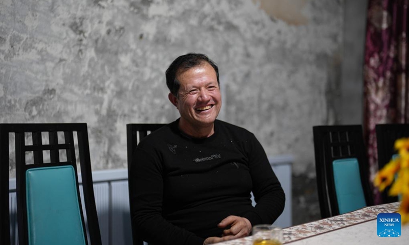 Musajan Khairat talks about expectation for this year's national legislative session at his home in Xinyuan County of Ili Kazak Autonomous Prefecture, northwest China's Xinjiang Uygur Autonomous Region, Feb. 8, 2026. Photo: Xinhua