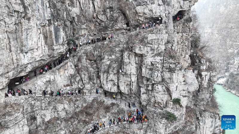 An aerial drone photo taken on March 16, 2024 shows tourists hiking in Gulu Village of Hanyuan County, southwest China's Sichuan Province. Photo: Xinhua