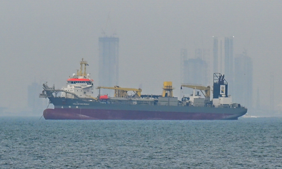 A commercial vessel anchors off the coast of Dubai, UAE, on March 2, 2026, amid ongoing navigational disruptions in the Strait of Hormuz. Photo: VCG