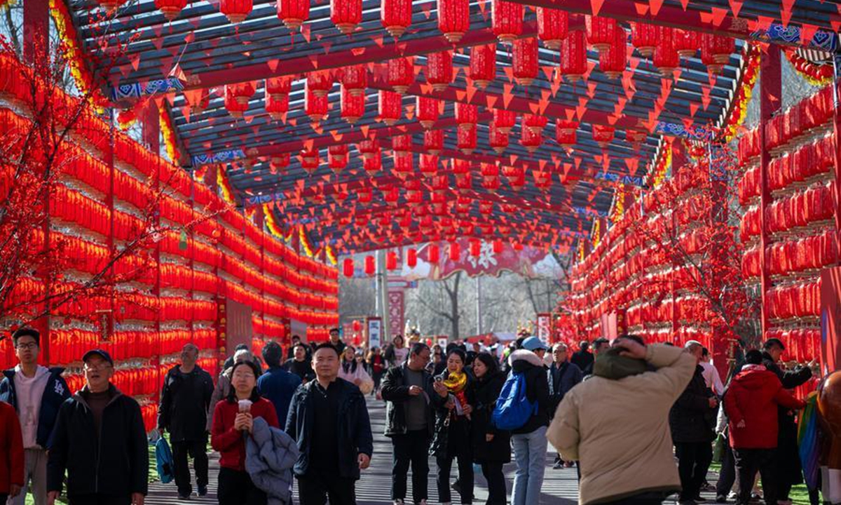 Tourists visit a fair in Haidian District of Beijing, capital of China, Feb. 19, 2026. (Xinhua/Hu Jingwen)