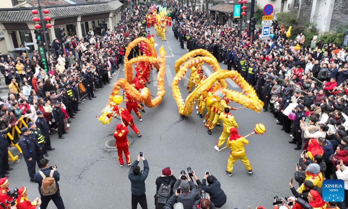 A drone photo taken on Feb. 28, 2026 shows dragon dance teams marching during a parade in Deqing County of Huzhou, east China's Zhejiang Province.
Various activities were held across China to celebrate the Lantern Festival, which falls on the fifteenth day of the first month of the Chinese lunar calendar, or March 3 this year. (Photo by Xie Shangguo/Xinhua)