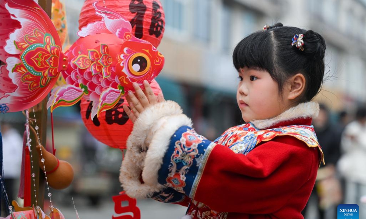 A girl looks at a fish-shaped lantern during a parade in celebration of the upcoming Lantern Festival in Ninghai County of Ningbo, east China's Zhejiang Province, Feb. 28, 2026.
Various activities were held across China to celebrate the Lantern Festival, which falls on the fifteenth day of the first month of the Chinese lunar calendar, or March 3 this year. (Photo by Hu Xuejun/Xinhua)