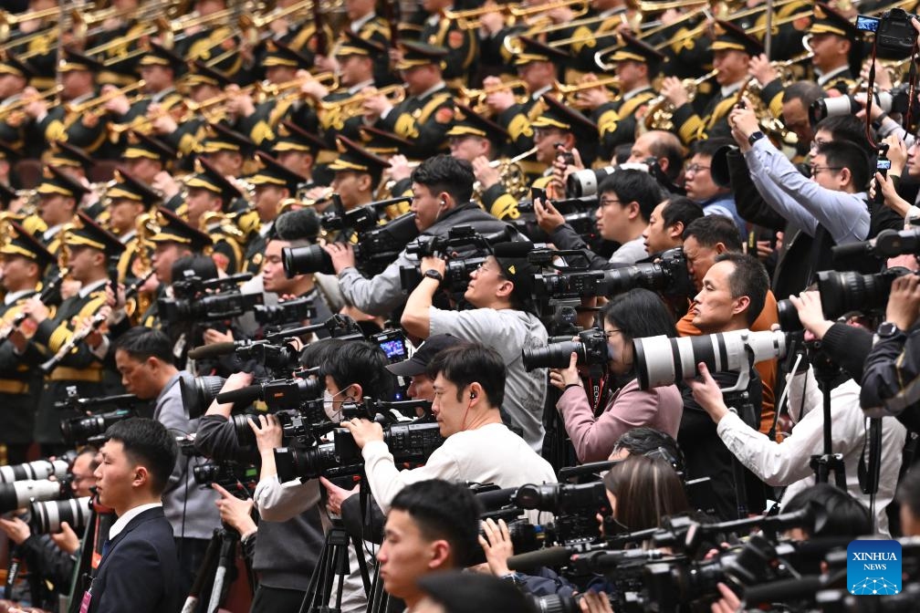 Journalists work at the opening meeting of the fourth session of the 14th Chinese People's Political Consultative Conference (CPPCC) National Committee at the Great Hall of the People in Beijing, capital of China, March 4, 2026. (Xinhua/Li He)l Consultative Conference (CPPCC) National Committee is held at the Great Hall of the People in Beijing, capital of China, March 4, 2026. (Xinhua/Liu Bin)