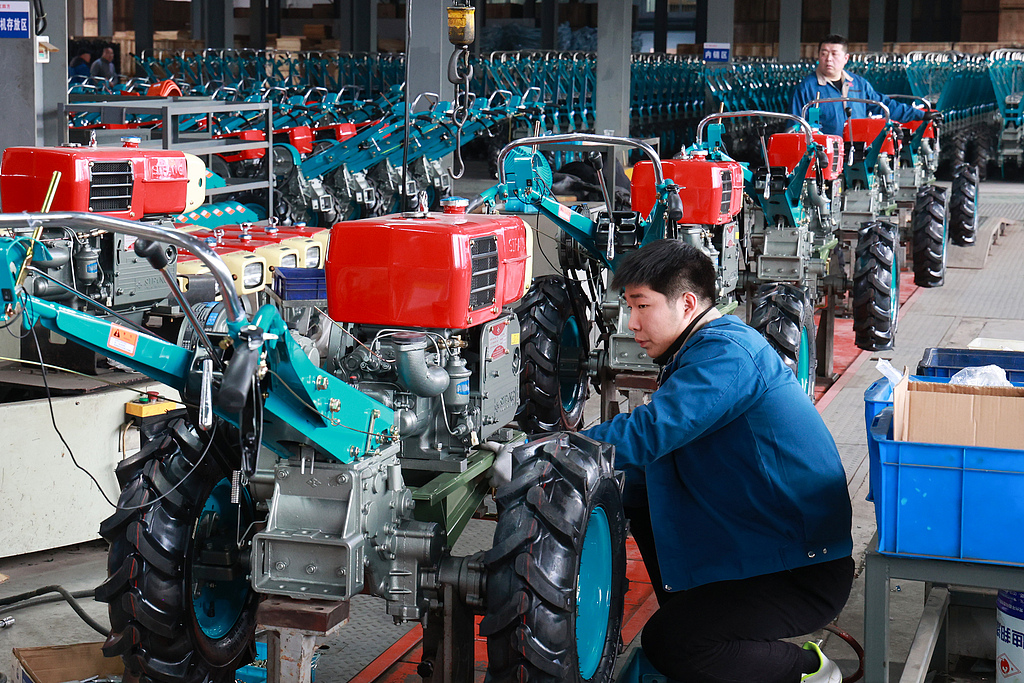 Workers assemble walk-behind tractors at a workshop in Jinhua, East China's Zhejiang Province, on March 4, 2026. Zhejiang-made tractors will be sent to locations within the province and to East China's Jiangsu Province, Central China's Hunan Province, South China's Guangxi Zhuang Autonomous Region and other regions to support local spring plowing. Photo: VCG 
