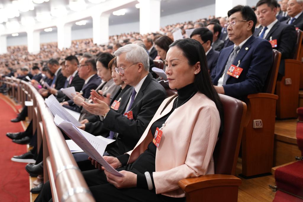 Members of the National Committee of the Chinese People's Political Consultative Conference (CPPCC) sit in on the opening meeting of the fourth session of the 14th National People's Congress (NPC) as non-voting participants at the Great Hall of the People in Beijing, capital of China, March 5, 2026. (Xinhua/Li Xiao)