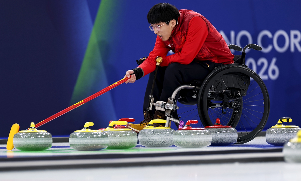 Yang Jinqiao of China competes during the mixed doubles round robin match against Latvia at the Milano Cortina 2026 Winter Paralympic Games at the Cortina Curling Olympic Stadium on March 5, 2026 in Cortina d'Ampezzo, Italy. China won 10-2. Photo: VCG