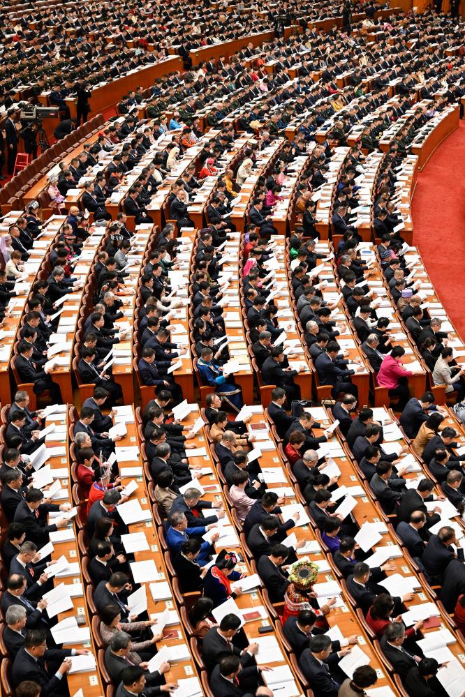 The opening meeting of the fourth session of the 14th National People's Congress (NPC) is held at the Great Hall of the People in Beijing, capital of China, March 5, 2026. (Xinhua/Yin Bogu)