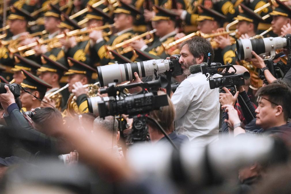 Journalists work at the opening meeting of the fourth session of the 14th National People's Congress (NPC) at the Great Hall of the People in Beijing, capital of China, March 5, 2026. (Xinhua/Wang Xi)