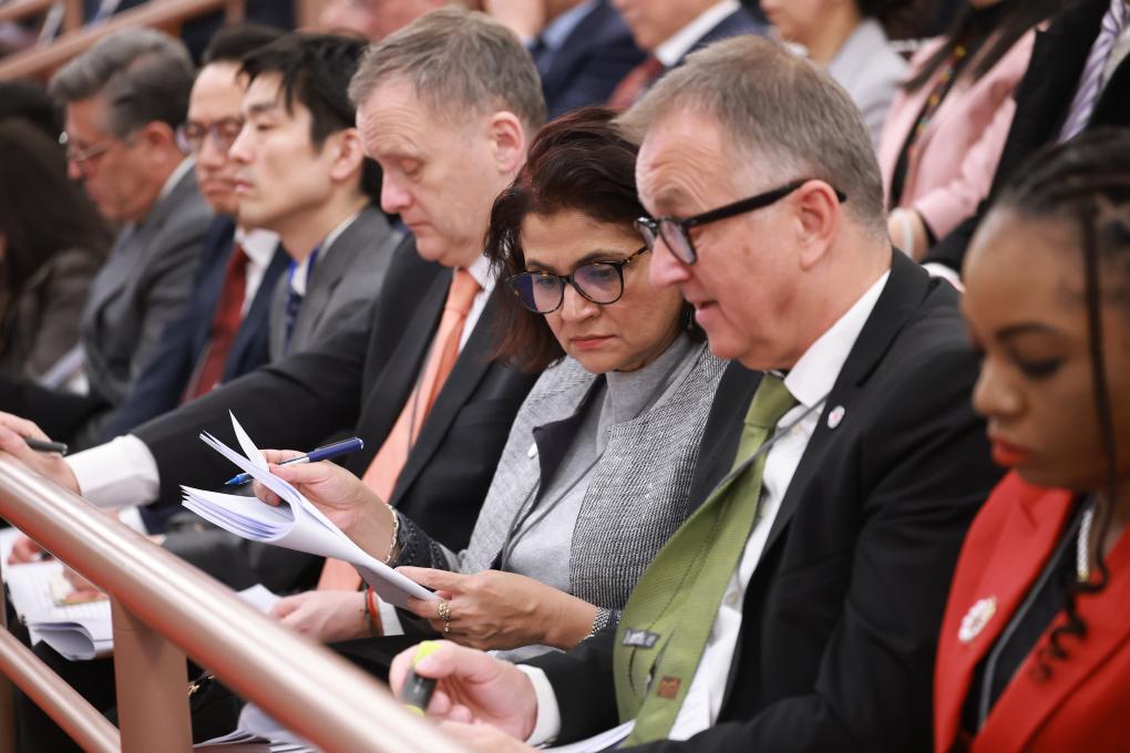 Foreign diplomatic envoys to China attend the opening meeting of the fourth session of the 14th National People's Congress (NPC) at the Great Hall of the People in Beijing, capital of China, March 5, 2026. (Xinhua/Liu Bin)
