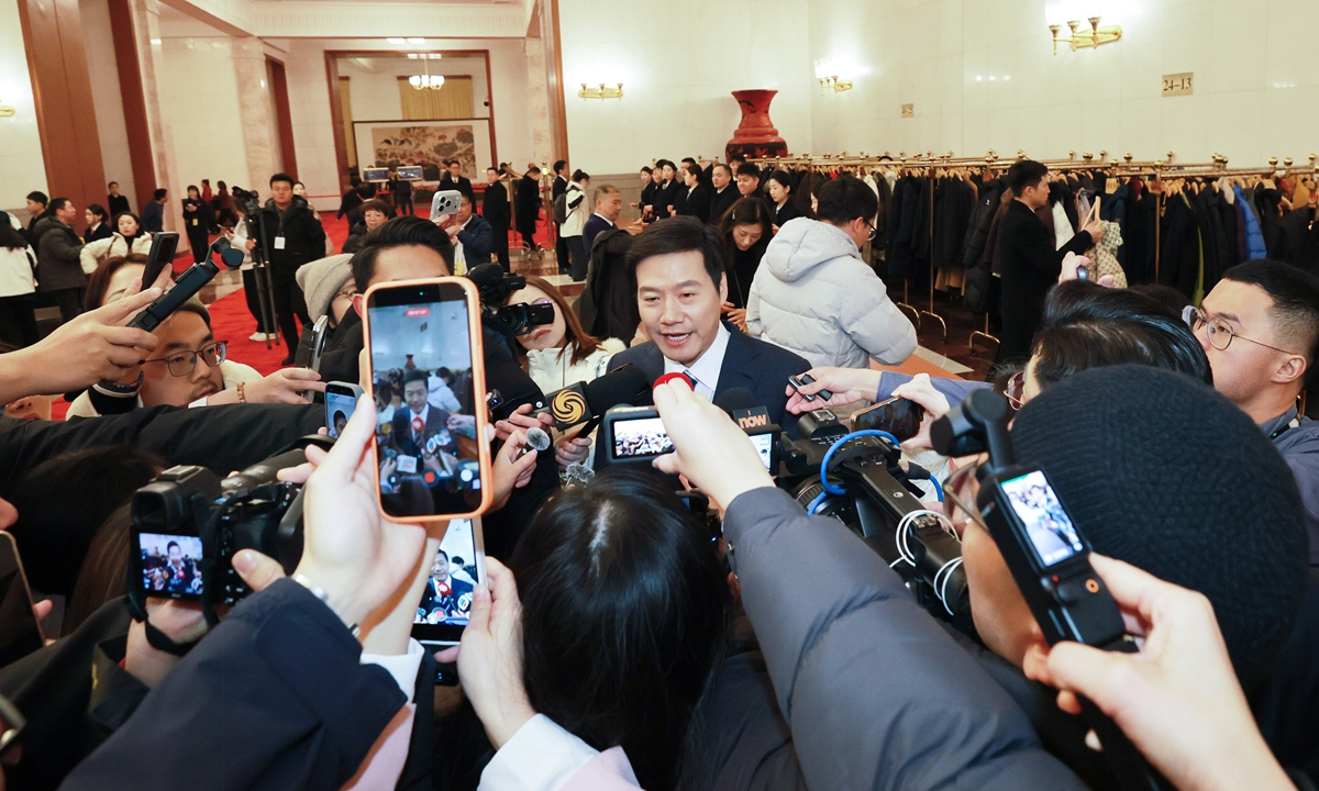 Lei Jun, CEO of Xiaomi and a member of the 14th National Committee of the CPPCC, speaks with reporters on March 5, 2026. Photo: VCG