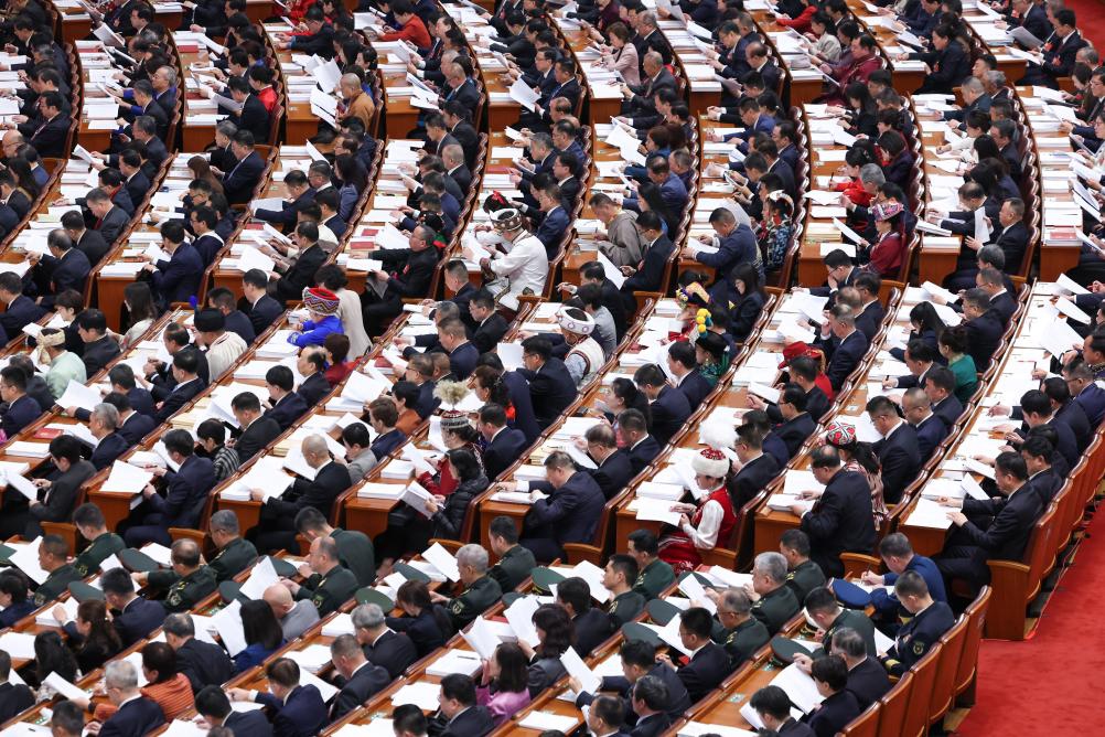 The opening meeting of the fourth session of the 14th National People's Congress (NPC) is held at the Great Hall of the People in Beijing, capital of China, March 5, 2026. (Xinhua/Liu Weibing)