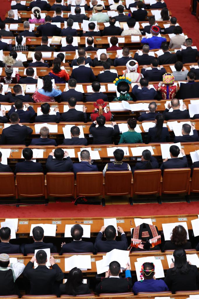 The opening meeting of the fourth session of the 14th National People's Congress (NPC) is held at the Great Hall of the People in Beijing, capital of China, March 5, 2026. (Xinhua/Liu Weibing)