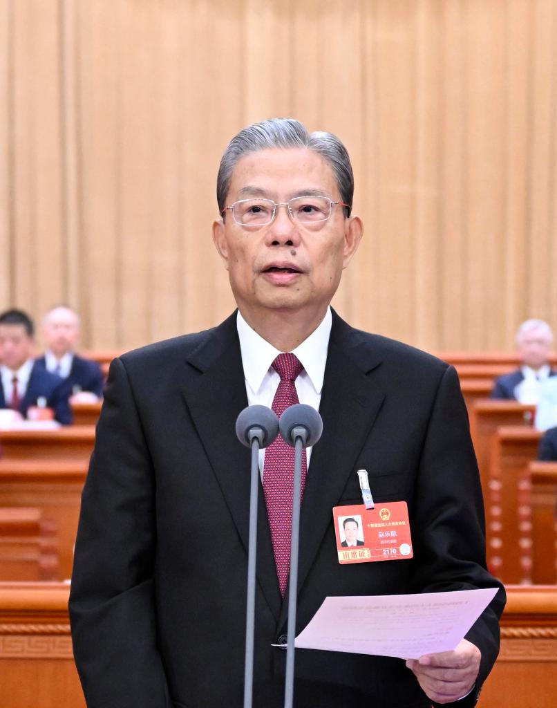 Zhao Leji presides over the opening meeting of the fourth session of the 14th National People's Congress (NPC) at the Great Hall of the People in Beijing, capital of China, March 5, 2026. (Xinhua/Shen Hong)