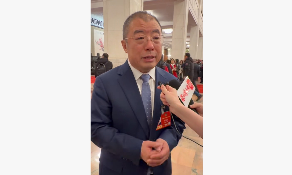 Qi Xiangdong, a member of the 14th National Committee of the Chinese People's Political Consultative Conference and chairman of Qi An Xin Group, speaks with the Global Times on March 5, 2026. Photo: Screenshot of a video shot by Chen Qingqing 