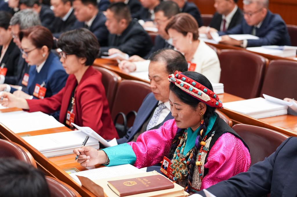 The opening meeting of the fourth session of the 14th National People's Congress (NPC) is held at the Great Hall of the People in Beijing, capital of China, March 5, 2026. (Xinhua/Xing Guangli)