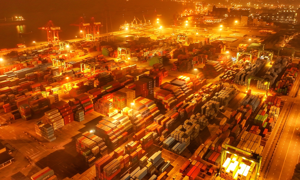 At the container terminal of Zhangjiagang Port Area in Suzhou Port, East China's Jiangsu Province, container trucks shuttle back and forth on March 5, 2026, presenting a scene of bustling activity. Photo: VCG