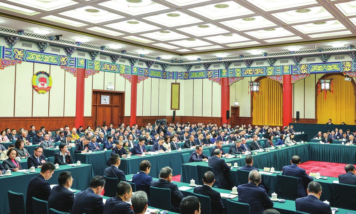 A joint group meeting of political advisors from the delegations of Hong Kong and Macao special administrative regions is held on March 6, 2026 in the auditorium of the National Committee of the Chinese People's Political Consultative Conference. Photo: VCG