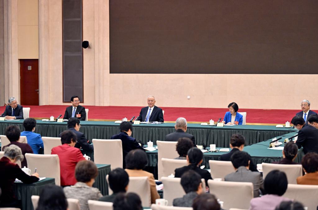 Cai Qi, a member of the Standing Committee of the Political Bureau of the Communist Party of China (CPC) Central Committee and a member of the Secretariat of the CPC Central Committee, participates in a joint group meeting of political advisors from the China Democratic League, the Communist Youth League of China, the All-China Youth Federation, and the All-China Women's Federation at the fourth session of the 14th National Committee of the Chinese People's Political Consultative Conference (CPPCC) in Beijing, capital of China, March 6, 2026. (Photo: Xinhua)