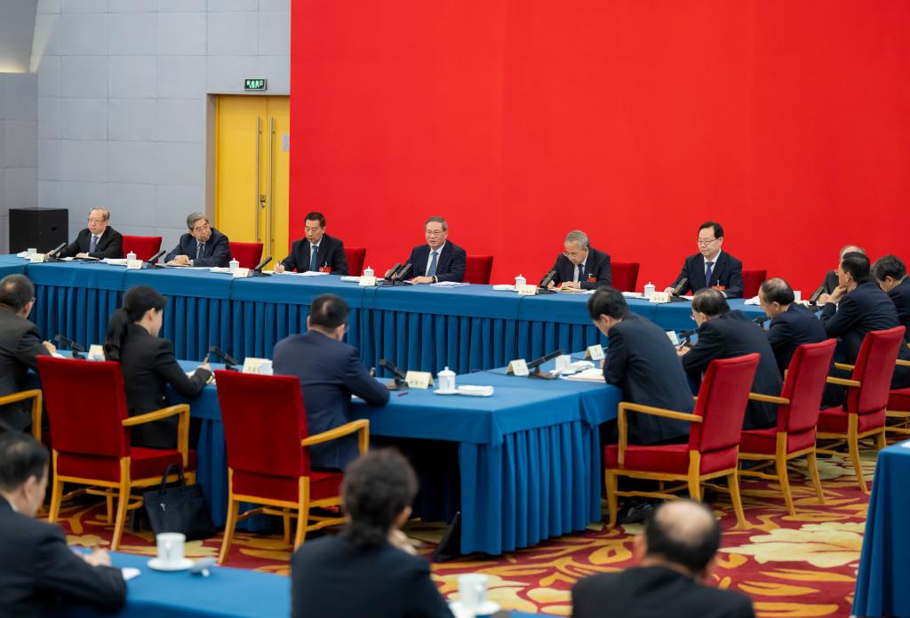 Li Qiang, a member of the Standing Committee of the Political Bureau of the Communist Party of China Central Committee and Chinese premier, takes part in a joint group meeting of political advisors from the sectors of economics and agriculture at the fourth session of the 14th National Committee of the Chinese People's Political Consultative Conference (CPPCC) in Beijing, capital of China, March 6, 2026. (Photo: Xinhua)