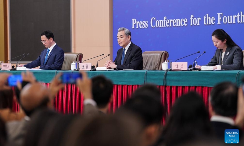 Chinese Foreign Minister Wang Yi, also a member of the Political Bureau of the Communist Party of China Central Committee, attends a press conference on China's foreign policy and external relations on the sidelines of the fourth session of the 14th National People's Congress (NPC) in Beijing, capital of China, March 8, 2026. (Xinhua/Fu Tian)
