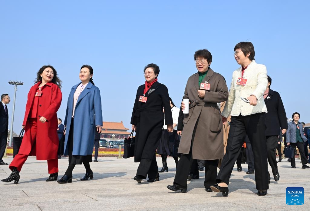 Members of the 14th National Committee of the Chinese People's Political Consultative Conference (CPPCC) walk towards the Great Hall of the People for the third plenary meeting of the fourth session of the 14th CPPCC National Committee in Beijing, capital of China, March 8, 2026. (Xinhua/Jin Liangkuai)