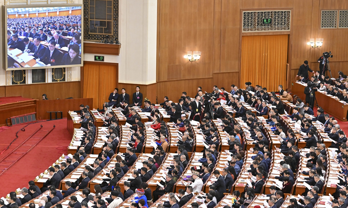 The fourth session of the 14th National People's Congress (NPC) holds its second plenary meeting on March 9, 2026. Photo: Xinhua 
