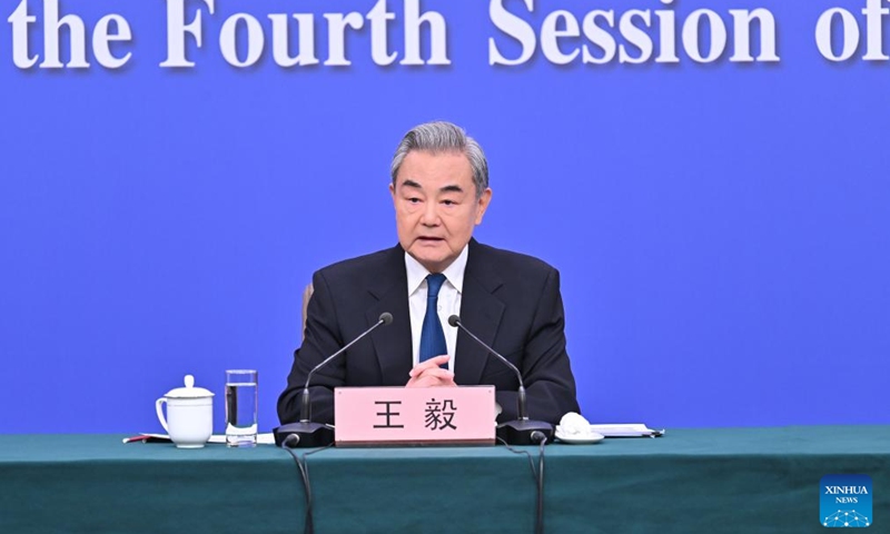 Chinese Foreign Minister Wang Yi, also a member of the Political Bureau of the Communist Party of China Central Committee, attends a press conference on China's foreign policy and external relations on the sidelines of the fourth session of the 14th National People's Congress (NPC) in Beijing, capital of China, March 8, 2026. (Xinhua/Li Xin)