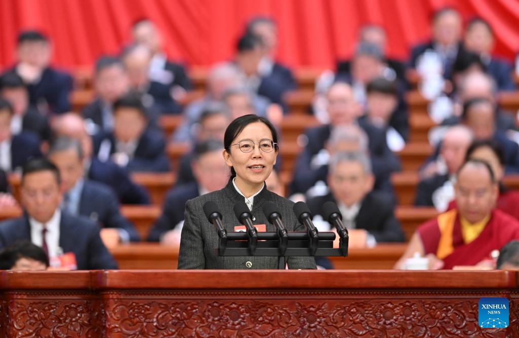 Chen Xingying, a member of the 14th National Committee of the Chinese People's Political Consultative Conference (CPPCC), speaks on behalf of the Central Committee of the Revolutionary Committee of the Chinese Kuomintang at the third plenary meeting of the fourth session of the 14th CPPCC National Committee at the Great Hall of the People in Beijing, capital of China, March 8, 2026. (Xinhua/Yue Yuewei)