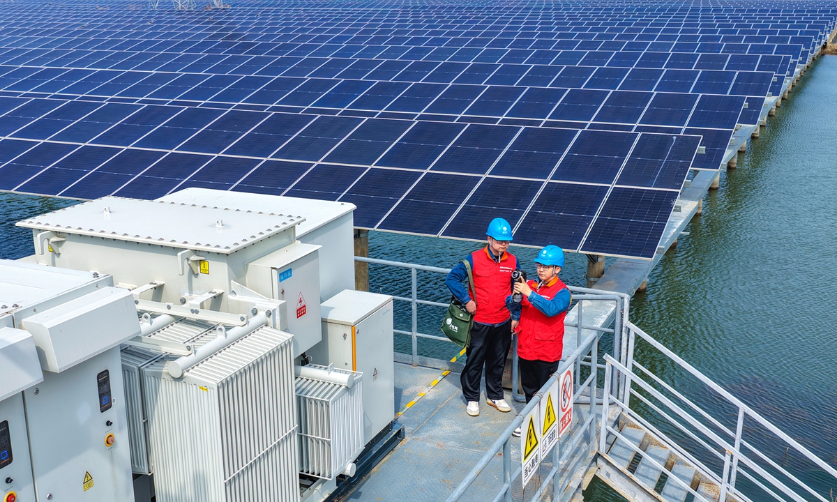 Staff members of State Grid Wuhu Power Supply Company inspect a photovoltaic power station in Wuhu, East China's Anhui Province, on February 28, 2026. Photo: VCG