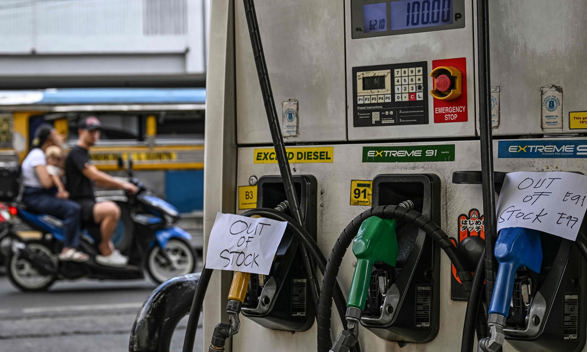 Signs reading 'out of stock' are displayed at a gas station amid rising petrol prices in Manila on March 9, 2026. The price for a barrel of Brent crude, the global oil benchmark, surged as much as 29 percent to $119.50 per barrel early on the same day. Photo: VCG