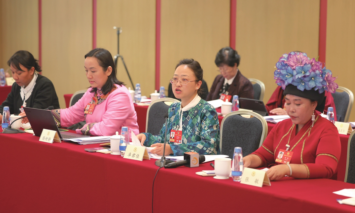 Members of the 14th National Committee of the Chinese People's Political Consultative Conference (CPPCC) from ethnic minorities hold a group discussion on March 5, 2026. Photo: VCG