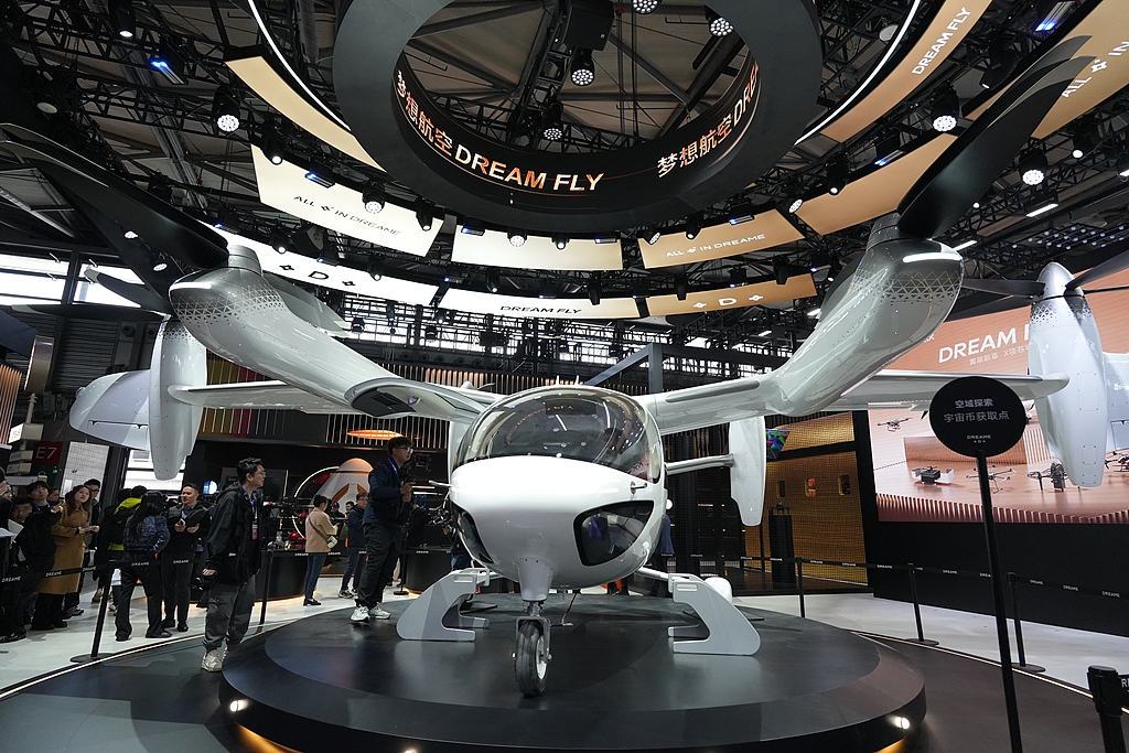 A futuristic electric vertical takeoff and landing aircraft developed by Dreamfly Technology Co makes its debut at the Appliance & Electronics World Expo 2026 in Shanghai, on March 12, 2026. The event runs from March 12 to 15, featuring 1,200 enterprises across 170,000 square meters, at the Shanghai New International Expo Center and the Eastern Hub business zone. Photo: VCG