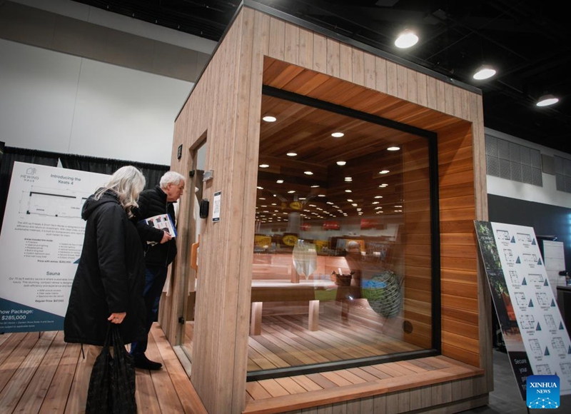 Visitors view an outdoor sauna unit during the 2026 BC Home and Garden Show in Vancouver, British Columbia, Canada, on March 12, 2026. The four-day event runs through March 15. Photo: Xinhua