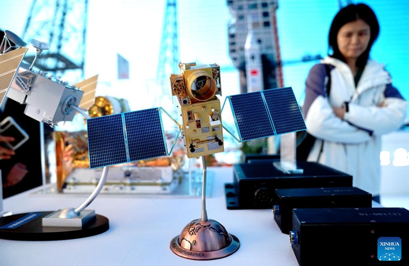 A woman visits the 2026 Shanghai Commercial Aerospace Conference & Exhibition at Shanghai New International Expo Center in Shanghai, east China, March 12, 2026. This event, also the founding session, kicked off here on Thursday and will last till March 14. Photo: Xinhua