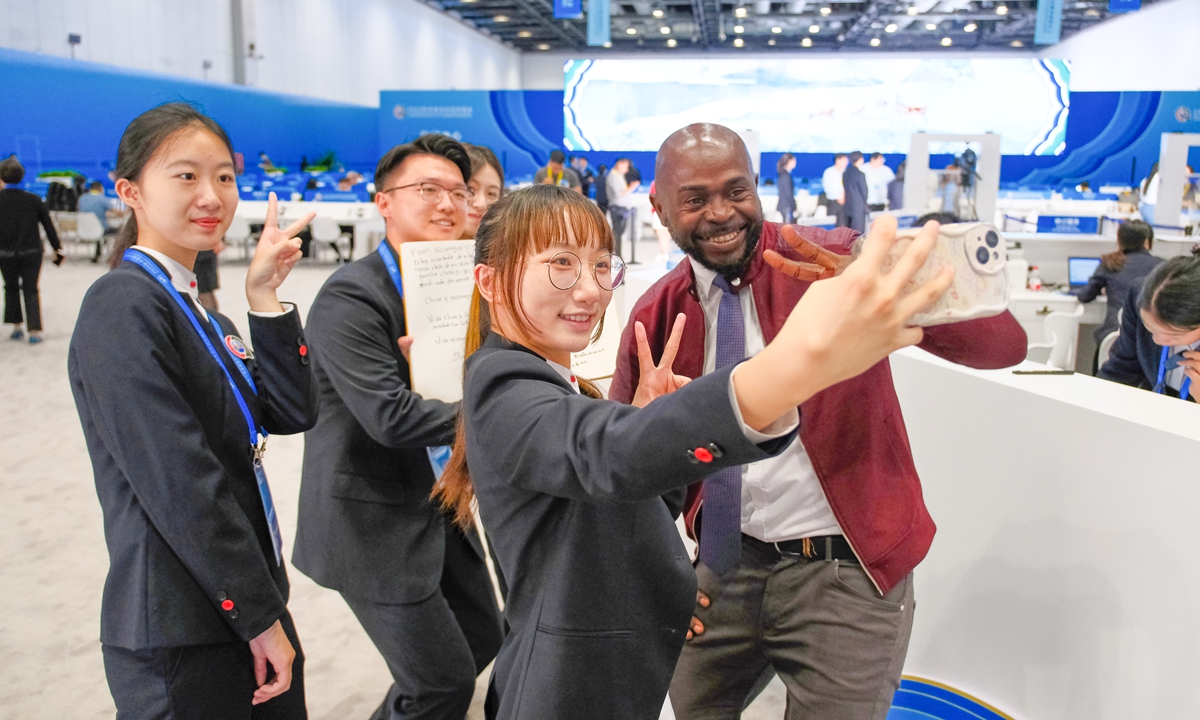 Participants pose for a group photo at the news center of the 2024 Summit of the Forum on China-Africa Cooperation in Beijing, on September 6, 2024. Photo: IC