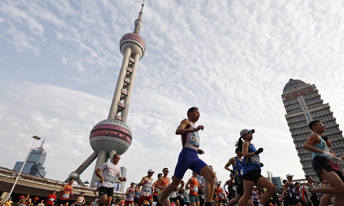 Some 15,000 runners participating in the Shanghai Half Marathon depart from the Oriental Pearl Tower as the race starts on March 15, 2026. Photo: VCG