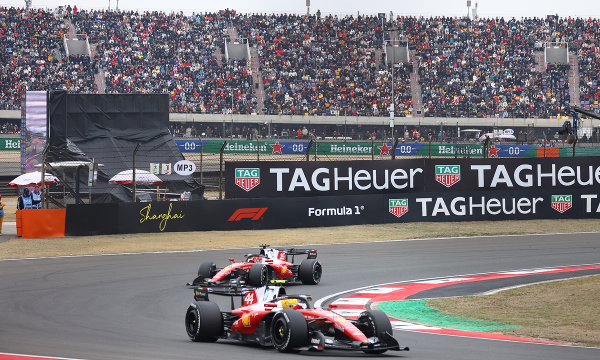 Spectators watch the 2026 Formula 1 Chinese Grand Prix race from the grandstands in Shanghai, March 15, 2026. Photo: VCG