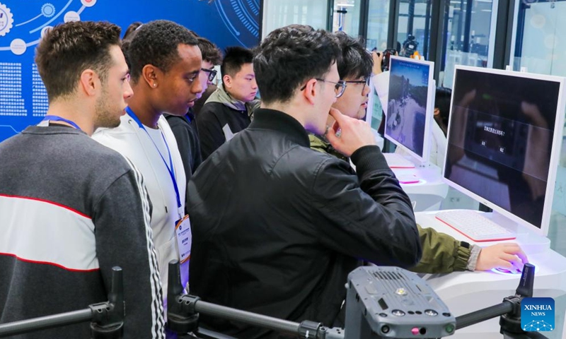 Students from Italy's Jobs Academy Foundation learn drone operation with a virtual simulation training system at Tianjin Modern Vocational Technology College in north China's Tianjin Municipality, March 16, 2026. (Tianjin Modern Vocational Technology College/Handout via Xinhua)

