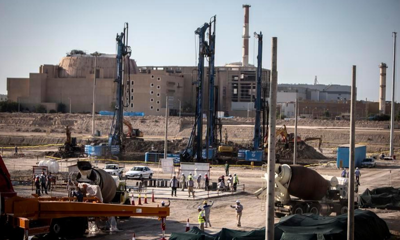 Laborers work at the construction site of the second phase of Iran's Bushehr Nuclear Power Plant in Bushehr, southern Iran, on Nov. 10, 2019. (Photo by Ahmad Halabisaz/Xinhua)
