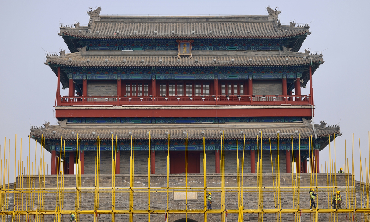 Workers erect scaffolding around the Yongdingmen Gate of the Beijing Central Axis on March 17, 2026, marking the official start of a main restoration project. The Beijing Central Axis was added to the UNESCO World Heritage List in July 2024. Photo: VCG