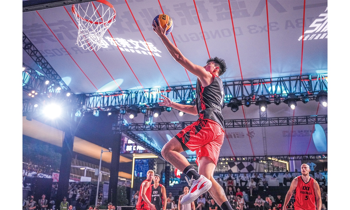 A Chinese athlete goes for a layup during a FIBA 3x3  event in Dongguan, South China's Guangdong Province, on October 9, 2025. Photo: VCG